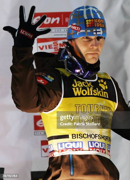 Janne Ahonen of Finland shows a five for his fith victory of the Tournee after the fourth round of the FIS Ski Jumping World Cup event at the 56th...