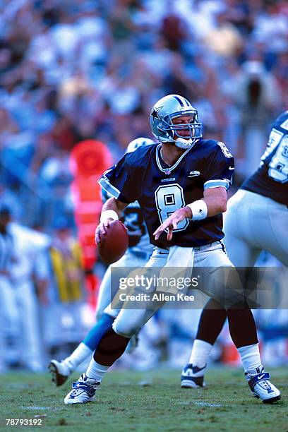 Quarterback Troy Aikman of the Dalas Cowboys drops back to pass in a 16 to 13 victory against the Carolina Panthers on .