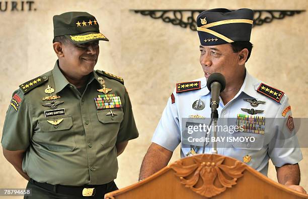 Indonesian outgoing military chief Air Chief Marshall Djoko Suyanto and his successor outgoing armed forces chief General Djoko Santoso hold a press...