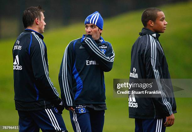 Ivica Olic, Rafael Van Der Vaart and Vadis Odjidja-Ofoe walk during the Hamburger SV training session at the HSH Nordbank Arena on January 07, 2008...