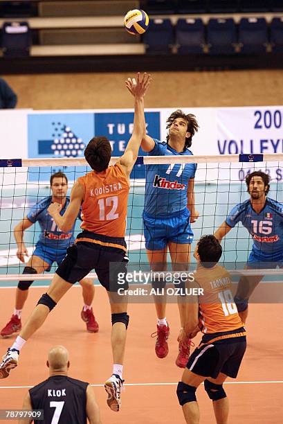 Matteo Martino of Italy tries to block the ball against Jeroen Paul Trommel of The Netherlands during a pre-olympic volleyball tournament at Halkali...