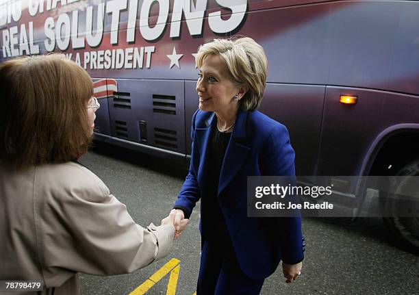 Democratic presidential candidate Sen. Hillary Clinton is greeted as she arrives for a campaign stop at Cafe Espresso January 7, 2008 in Portsmouth,...