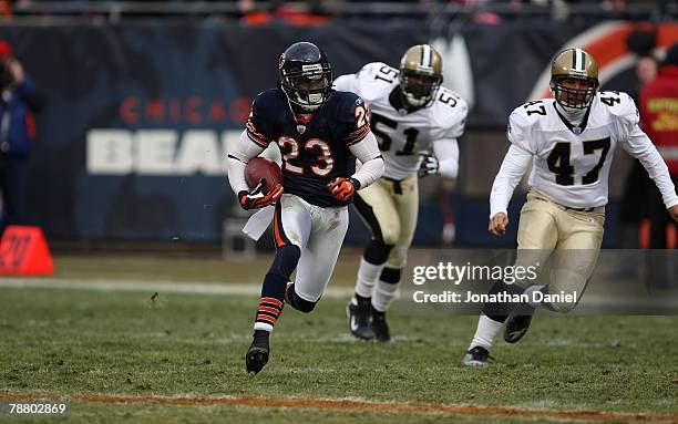 Devin Hester of the Chicago Bears returns a punt 64 yards for a touchdown in the third quarter against the New Orleans Saints at Soldier Field on...