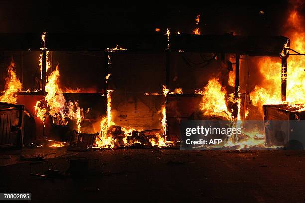 Bus in fire which was lite up by demonstrators against the Pianura rubbish dump is pictured 07 January 2008 in Naples. Police in Naples clashed with...