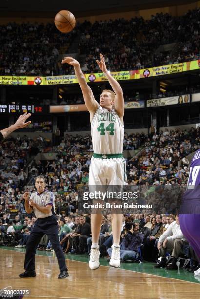 Brian Scalabrine of the Boston Celtics shoots a jump shot during the game against the Sacramento Kings at the TD Banknorth Garden on December 12,...