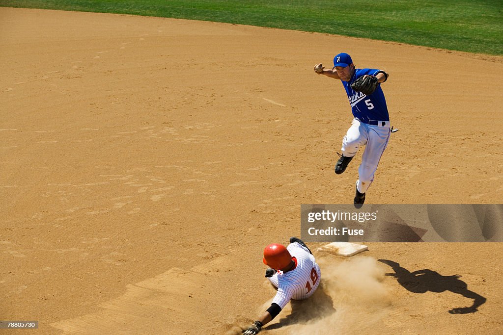 Running Sliding in to Second Base