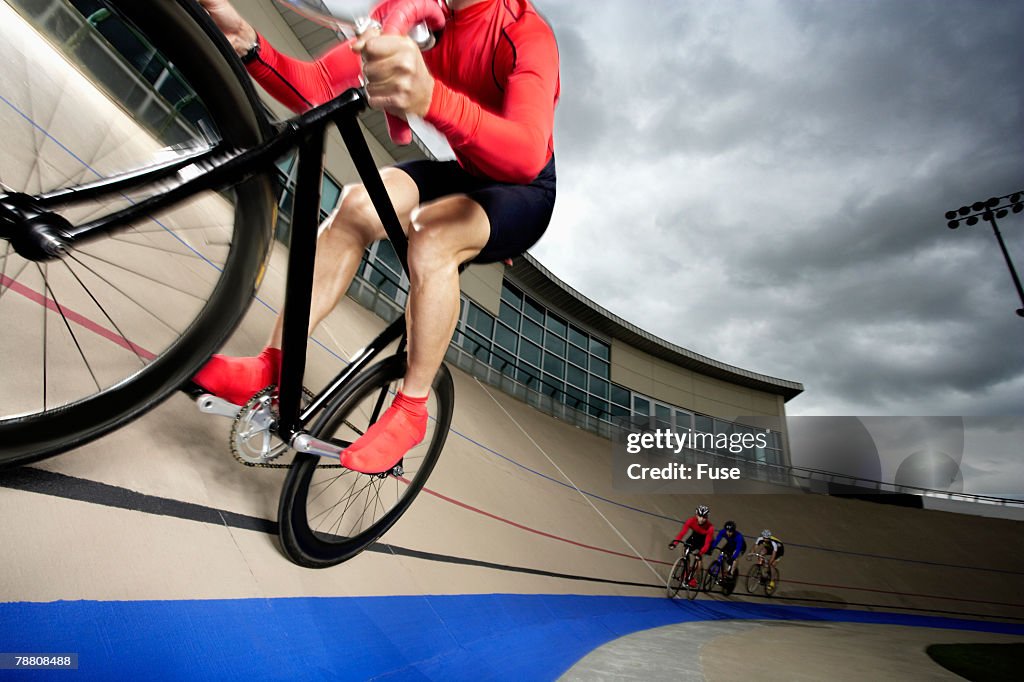 Four Racing Cyclists on Velodrome