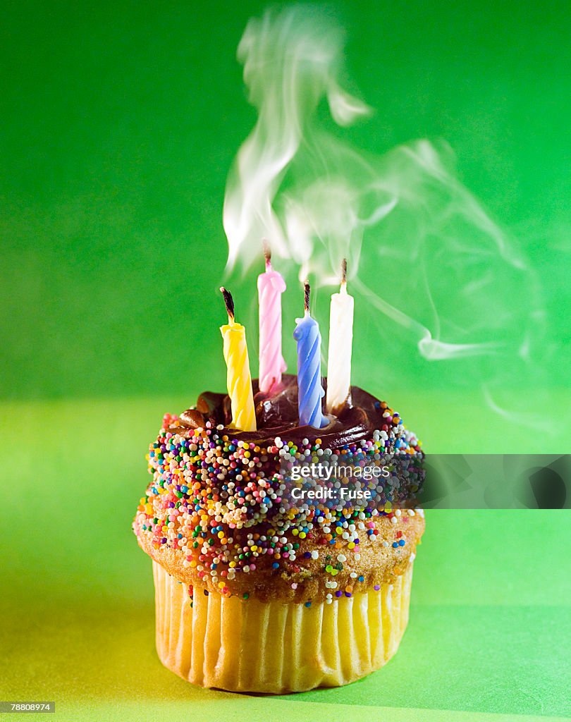 Smoking Birthday Candles on Cup Cake