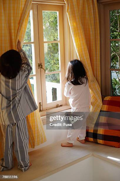 Kid Opening Window Kid Opening Blinds Photos and Premium High Res Pictures - Getty Images
