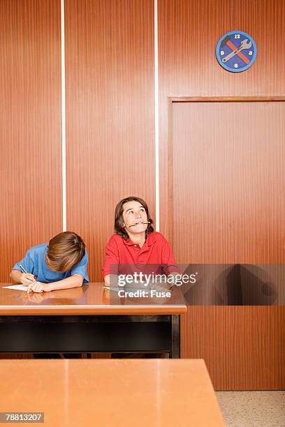 students in classroom - primary school exam stock pictures, royalty-free photos & images