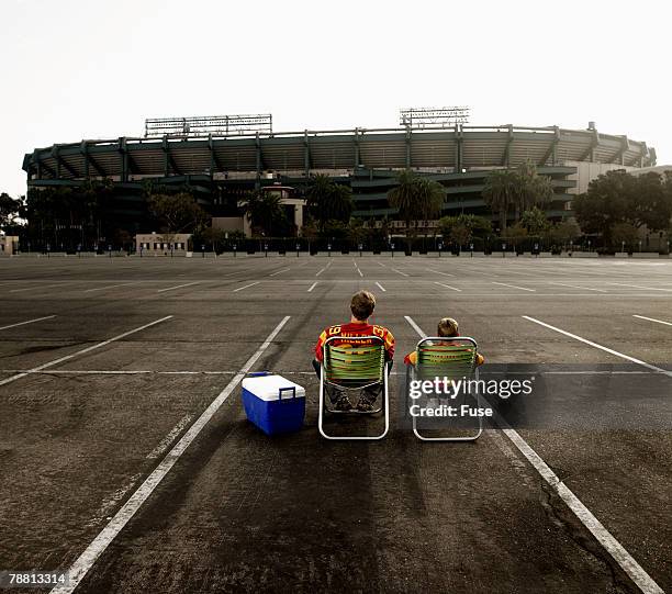 father and son tailgating - tailgate party stock pictures, royalty-free photos & images
