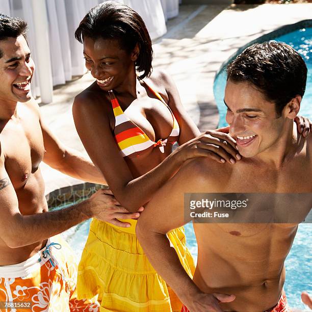 young friends dancing at pool party - conga stock pictures, royalty-free photos & images