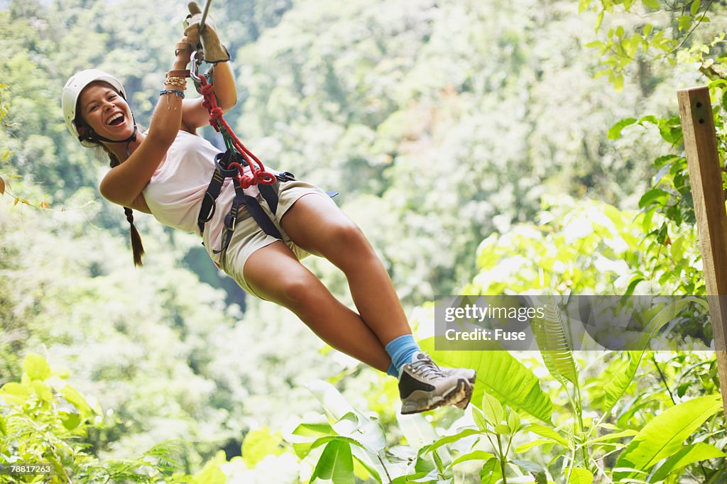 Young Woman Rappelling