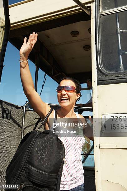 Getting Off Person Getting Off Bus Photos and Premium High Res Pictures - Getty Images