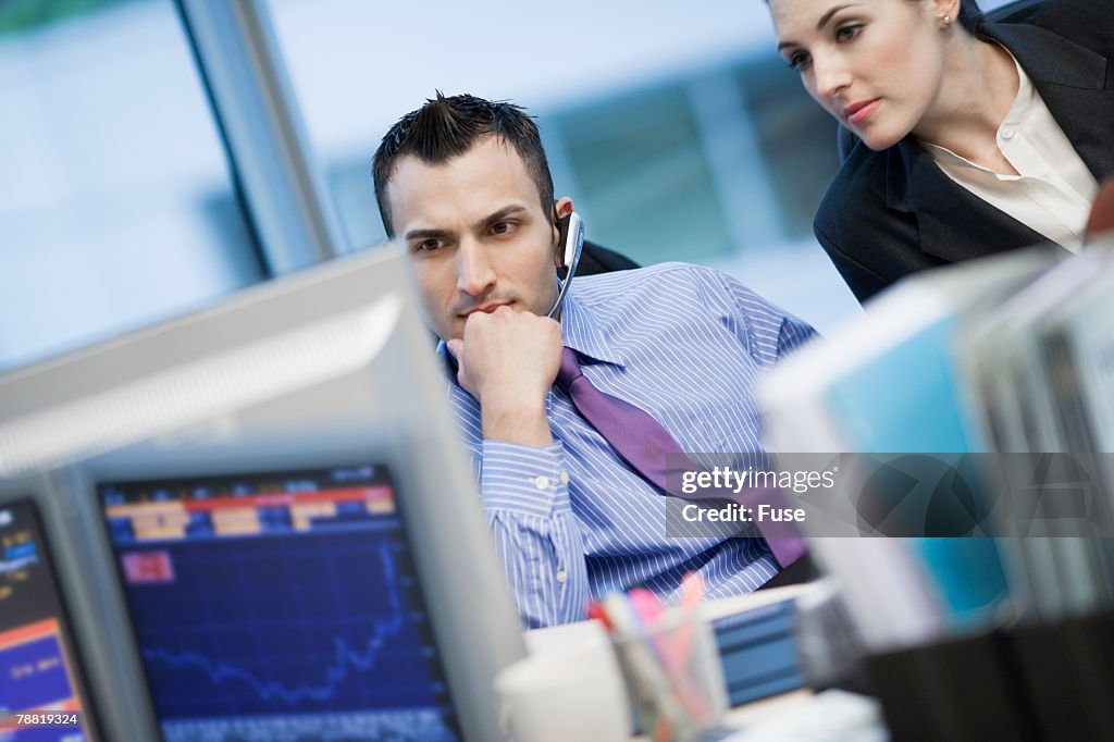 Businessman Using Headset Microphone