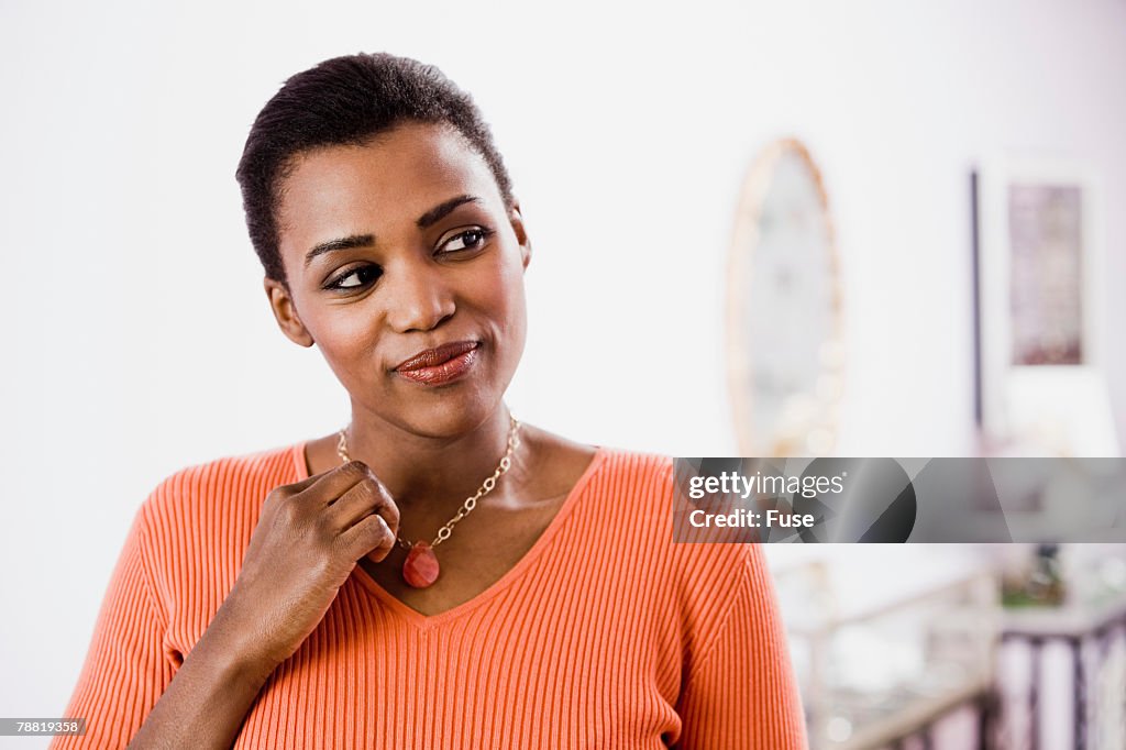 Woman Trying on Necklace