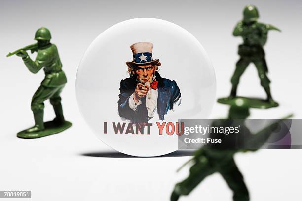 <i want you> button and toy soldiers - uncle sam i want you stock pictures, royalty-free photos & images