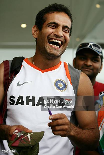 Mahendra Singh Dhoni of India signs autographs outside Nick's Seafood Restaurant as the Indian Cricket team visit Bondi Beach on January 8, 2008 in...