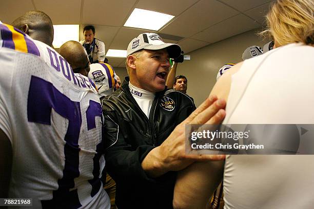 Head coach Les Miles of the Louisiana State University Tigers celebrates with his team in the lockerroom after defeating the Ohio State Buckeyes...