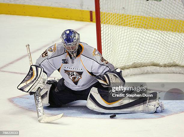 Goaltender Dan Ellis of the Nashville Predators makes a save against the Anaheim Ducks at the Honda Center January 7, 2008 in Anaheim, California....