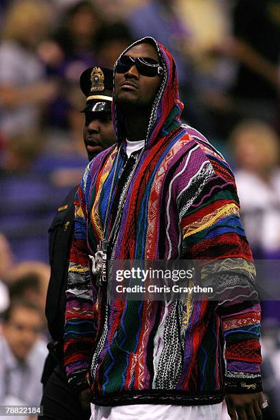 JaMarcus Russell, quarterback for the Oakland Raiders and alumi of the Louisiana State University Tigers walks on the field against the Ohio State...