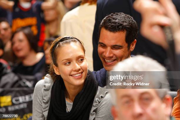 Actress Jessica Alba smiles with her fiancee, Cash Warren during the Golden State Warriors, San Antonio Spurs game on January 7, 2008 at Oracle Arena...