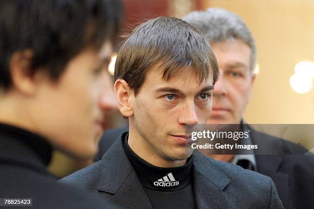 Head coach of the German ski jumpers Peter Rohwein , ski jumper Michael Neumayer and former ski jumper Martin Schmitt attend the funeral of former...