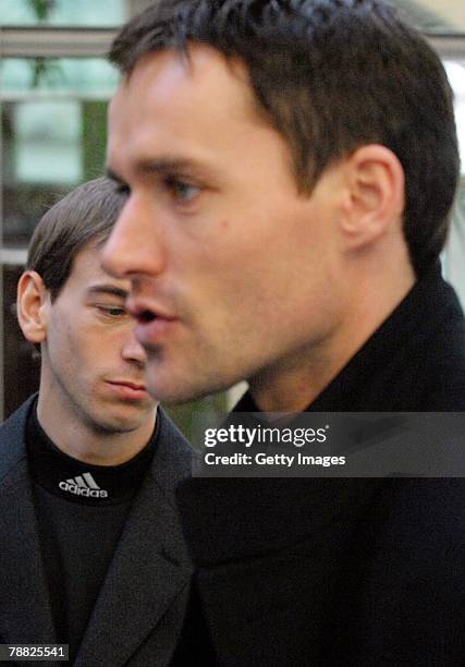 Former ski jumper Michael Neumayer and Sven Hannawald attend the funeral of former national ski jumping head coach Reinhard Hess on January 8, 2008...