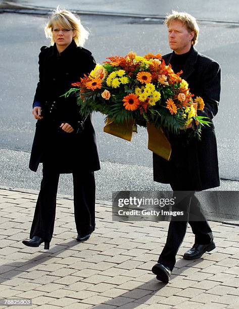 Former ski jumper Dieter Thoma and Mandana Daub attend the funeral of former national ski jumping head coach Reinhard Hess on January 8, 2008 in...