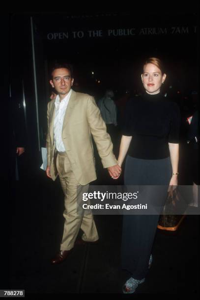 Molly Ringwald and her husband attend the premiere of "Guinevere" September 7, 1999 in New York City. The movie directed by Audrey Wells was about a...