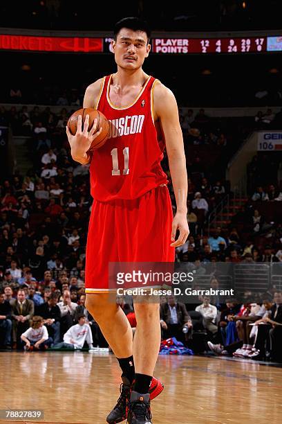 Yao Ming of the Houston Rockets holds the ball during the game against the Philadelphia 76ers on December 10, 2007 at Wachovia Center in...
