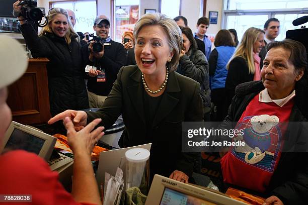 Democratic presidential candidate Sen. Hillary Clinton stops at a Dunkin's Donuts as she spends the day visiting polling locations on election day...