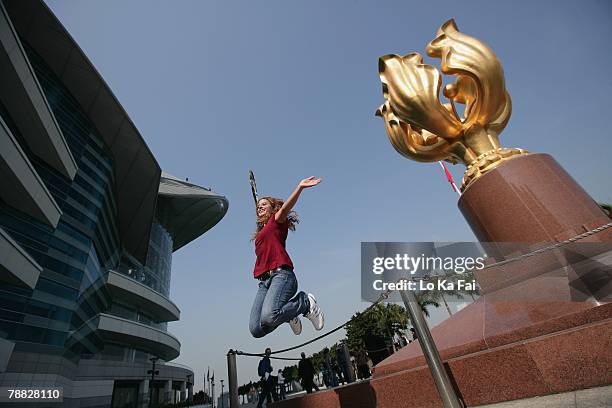 Tennis player Michelle Larcher de Brito of Portugal poses for a portrait session at the Golden Bauhimia Square outside the Hong Kong Convention and...