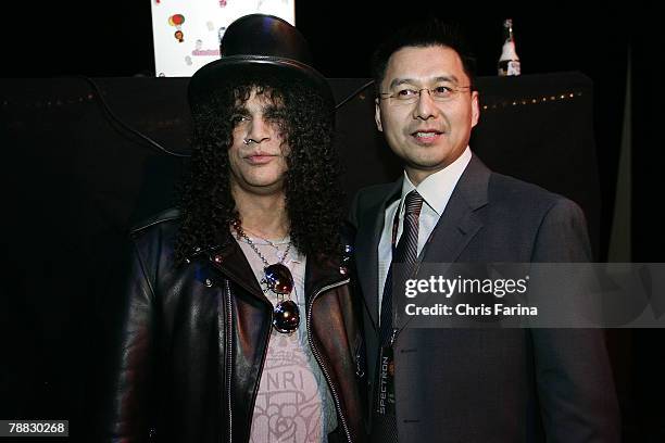 Slash of Guns N'Roses, Velvet Revolver and Spectroniq CEO Leo Chen at the Spectroniq 3-D CES Party at The Joint at the Hard Rock Hotel & Casino on...