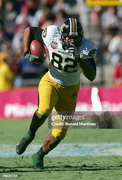 Martin Rucker of the Missouri Tigers carries the ball against the Arkansas Razorbacks during the AT&T Cotton Bowl Classic on January 1, 2008 at the...