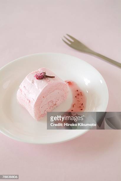 sponge roll - raspberry coulis stock pictures, royalty-free photos & images