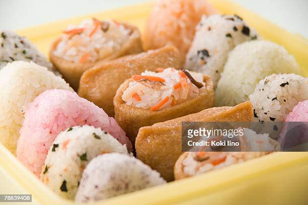 inari sushi and rice balls - inarizushi stock-fotos und bilder