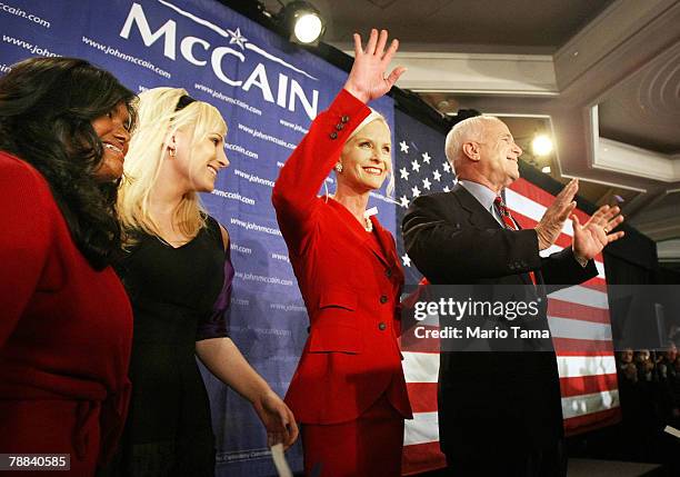 Sen. And Republican presidential contender John McCain celebrates with his wife Cindy , and daughters Bridget and Meghan after winning the Republican...