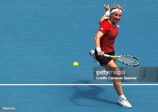 Svetlana Kuznetsova of Russia plays a backhand during her singles match against Fransesca Schiavone of Italy during day four of the Medibank...