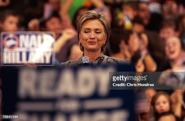 Democratic presidential hopeful Sen. Hillary Clinton pauses as she speaks during a post primary rally at Southern New Hampshire University January 8,...
