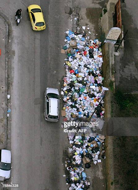 Aereal view taken 10 January 2008 of mountains of uncollected trash in Pianura, suburb of Naples, near a condemned dump which was closed in 1994...