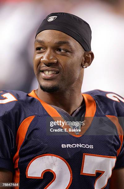 Denver Broncos cornerback Darrent Williams relaxes in the bench area in the fourth during the game against the Indianapolis Colts at Invesco Field in...