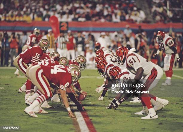 Joe Montana, Quarterback for the San Francisco 49ers calls the play on the line of scrimmage during the National Football League Super Bowl XXIII...