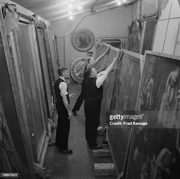 Art treasures from the National Gallery are moved to Manod Quarry slate caverns in Merionethshire, Wales, for safekeeping during World War II,...