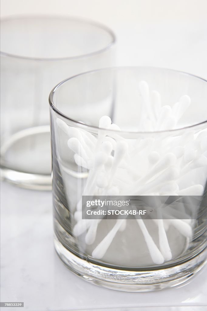 Cotton buds in a glass