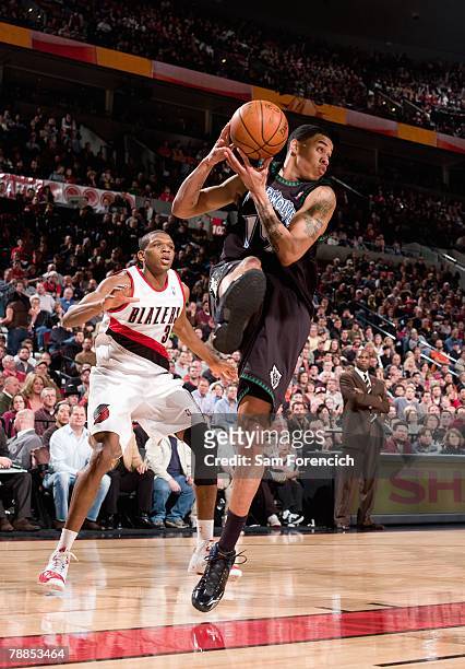 Gerald Green of the Minnesota Timberwolves grabs a rebound during the game against the Portland Trail Blazers at the Rose Garden Arena on December...