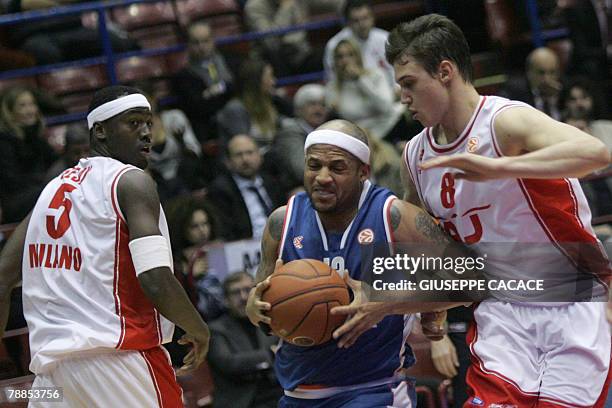 Milan's US player Ansu Sesay and Milan's player Danilo Gallinari fights for the ball with Zagreb's player Larry Ayuso during their Euroleague group B...