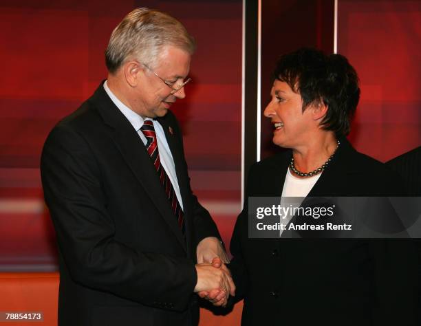 Roland Koch , State Governor of Hessen, shakes hands with German Justice Minister Brigitte Zypries during their discussion about the juvenile crime...
