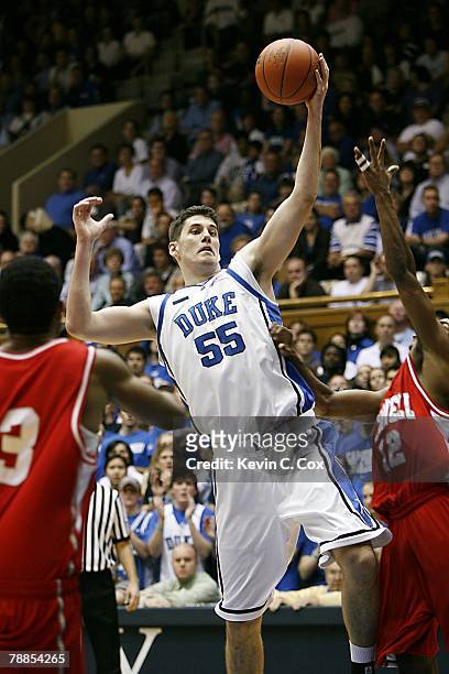 Brian Zoubek of the Duke Blue Devils moves the ball during the college basketball game against the Cornell Big Red at Cameron Indoor Stadium on...