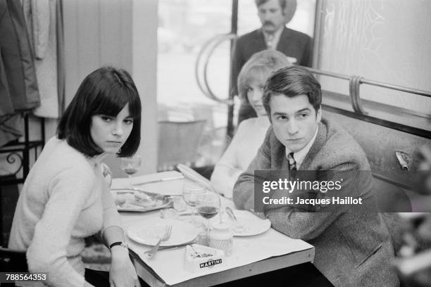 French actors Chantal Goya, Marlene Jobert and Jean-Pierre Leaud on the set of Masculin feminin: 15 faits precis, written and directed by...
